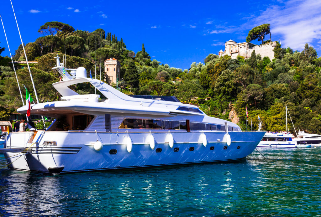 Luxurious yacht docked at a scenic location