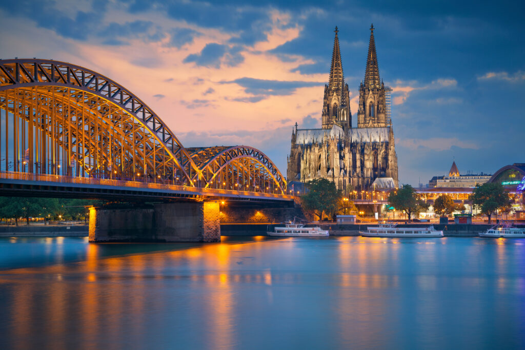 Cologne Cathedral and Hohenzollern Bridge at sunset